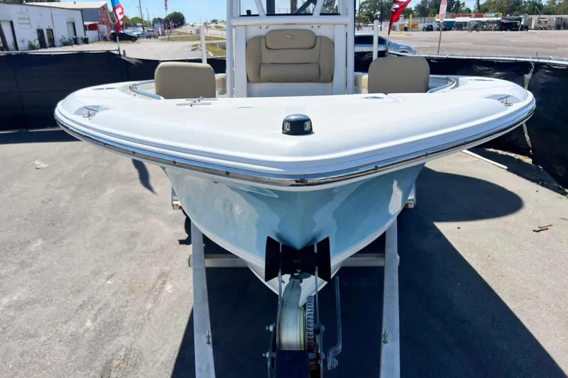 Slide: The Image of 2016 Sea Hunt Ultra 211 boat on trailer, front view, in outdoor setting. - 28