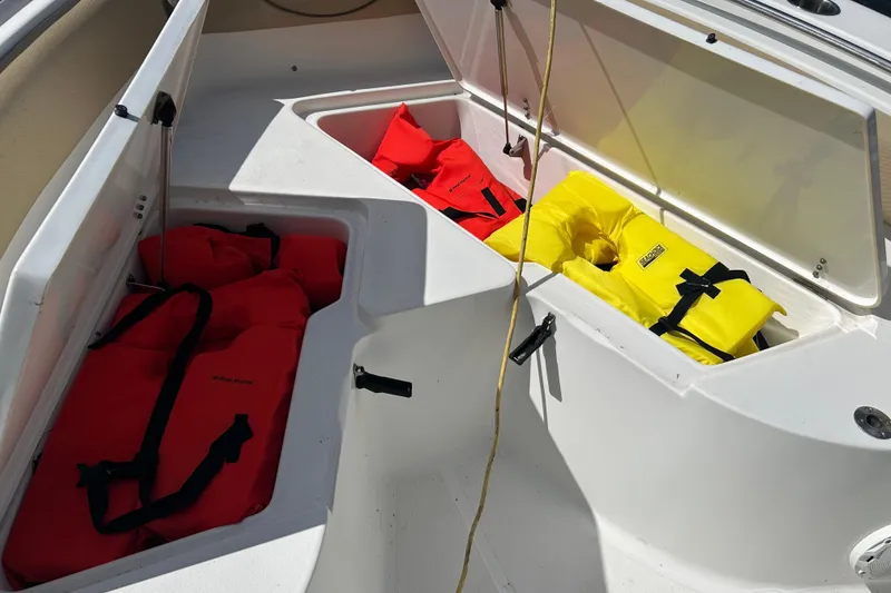 Slide: The Image of 2016 Sea Hunt Ultra 211 boat with identification plate and ABYC member sticker. - 6