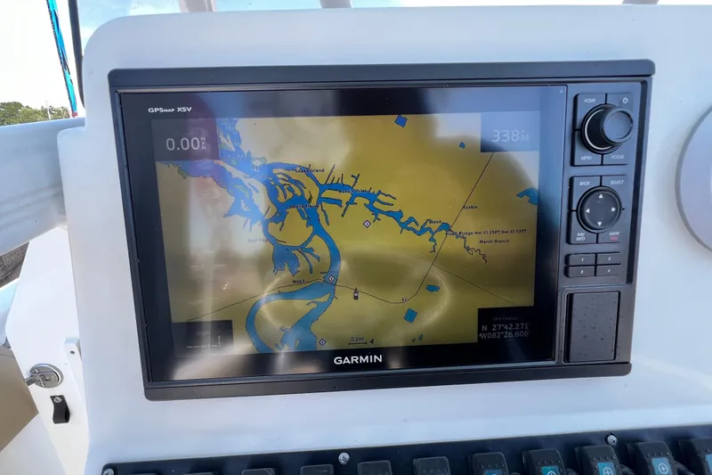 Slide: The Image of Garmin GPS display on 2016 Sea Hunt Ultra 211 boat, showing navigational map. - 84