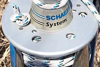 Slide: The Image of Schaefer winch system on a 2005 Catalina 310 sailboat, featuring durable ropes and hardware. - 11