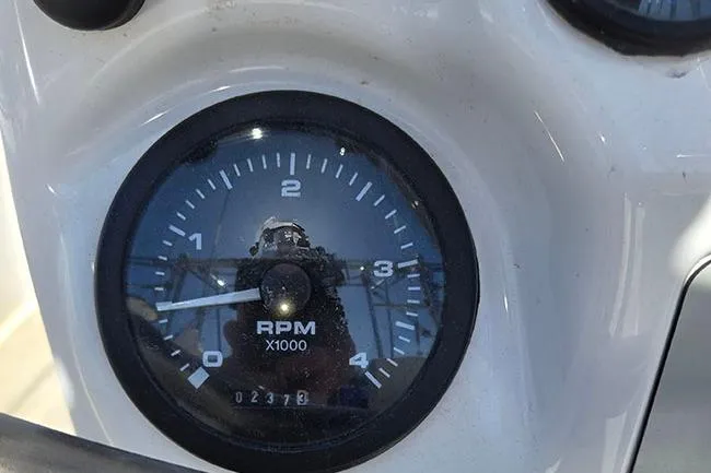 Slide: The Image of Close-up of a Catalina 310 tachometer showing RPM, model year 2005. - 17