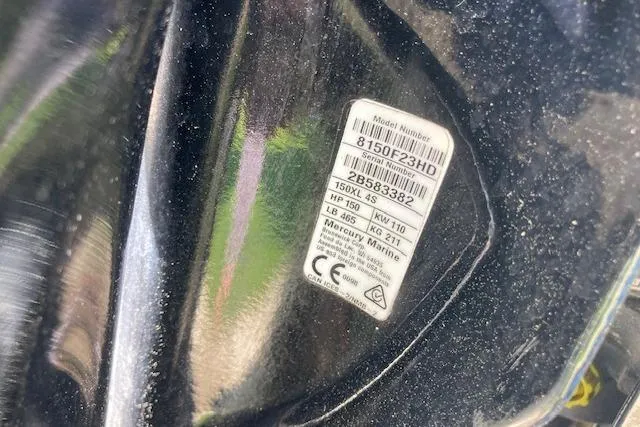 Slide: The Image of Label on a 2004 Palm Beach 205 cc boat, displaying model and serial numbers. - 13