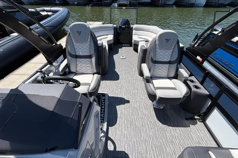 Slide: The Image of Luxurious 2026 Viaggio D26U boat interior with plush seating and modern design on the water. - 19