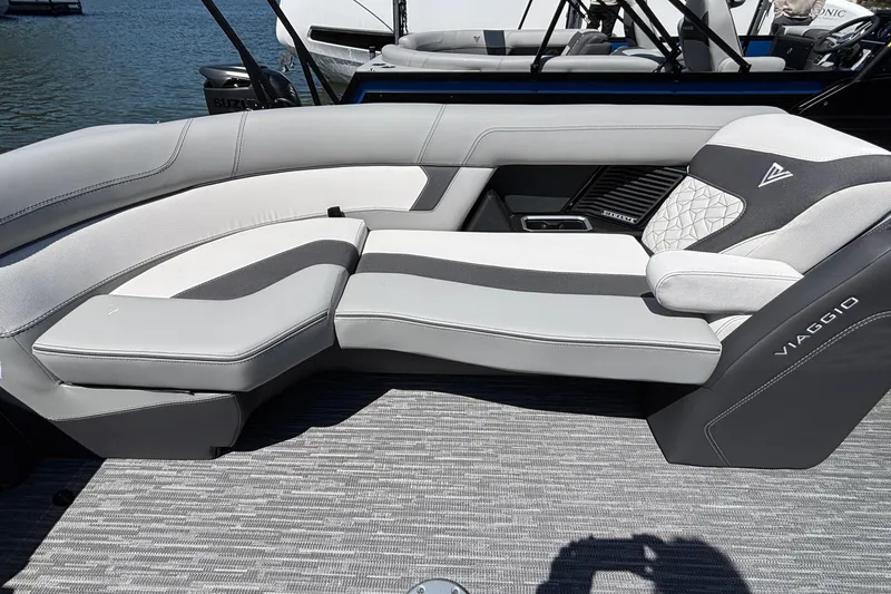 Slide: The Image of Luxurious seating on 2026 Viaggio D26U boat, featuring sleek gray and white upholstery. - 24