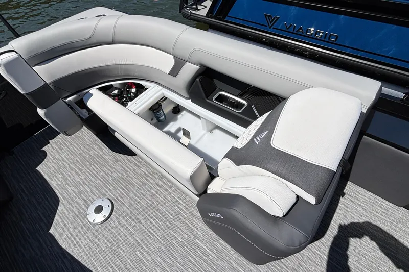 Slide: The Image of 2026 Viaggio D26U boat interior with open storage compartment and cushioned seating. - 27