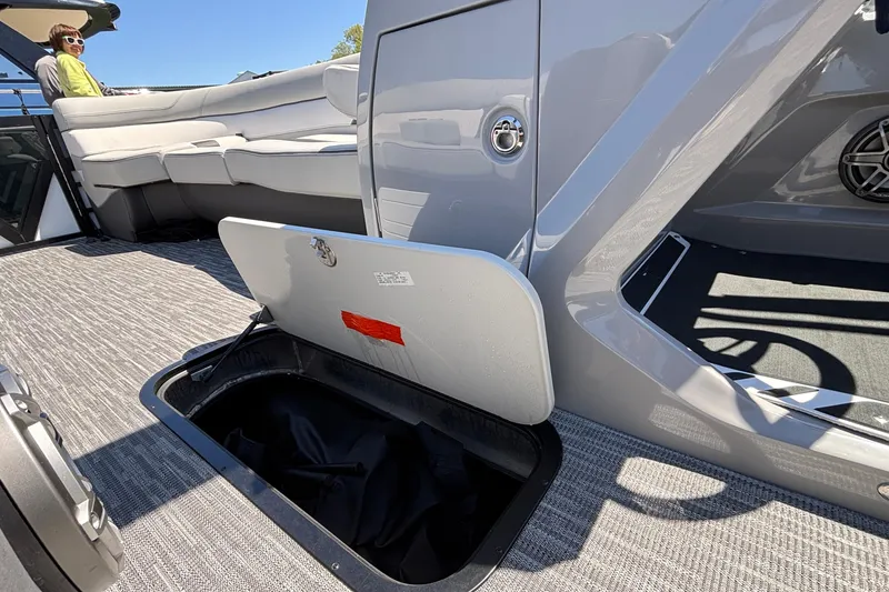 Slide: The Image of 2026 Viaggio D26U boat interior with open storage compartment and seating area. - 39