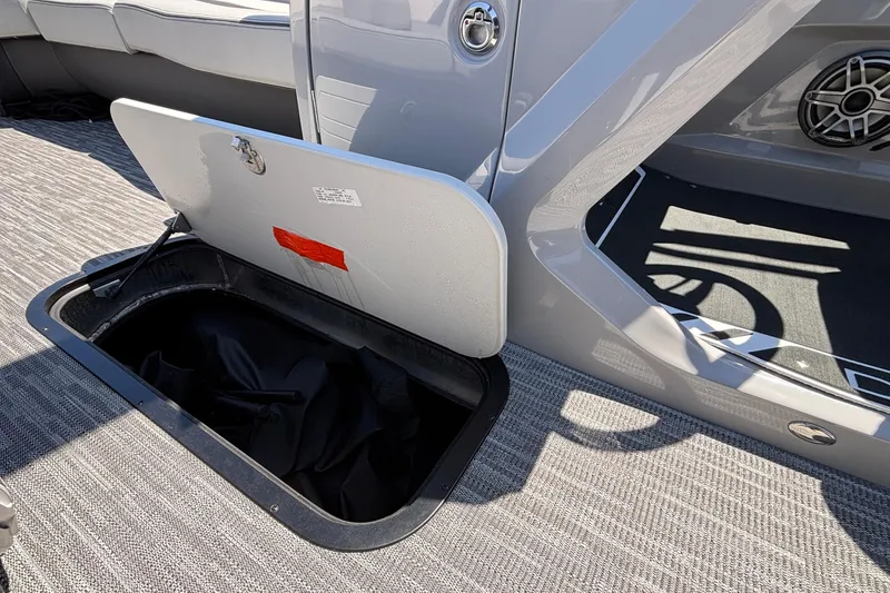 Slide: The Image of Open storage compartment on 2026 Viaggio D26U boat with gray interior. - 40