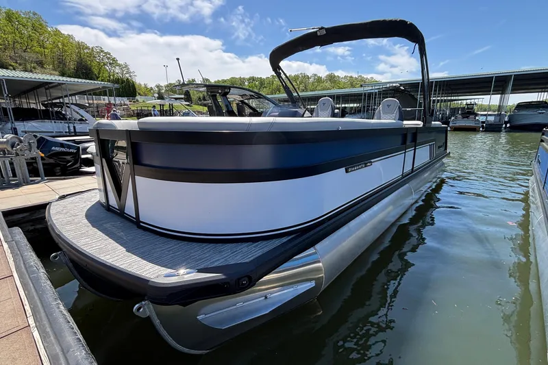 Slide: The Image of 2026 Viaggio D26U pontoon boat docked at marina under clear blue sky. - 43