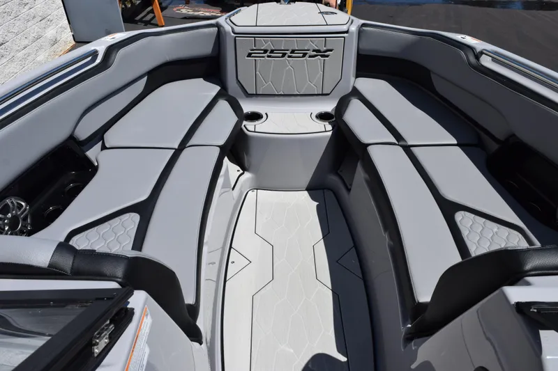 Slide: The Image of Interior of 2026 Yamaha Boats 255XD, featuring sleek gray seating and modern design. - 19