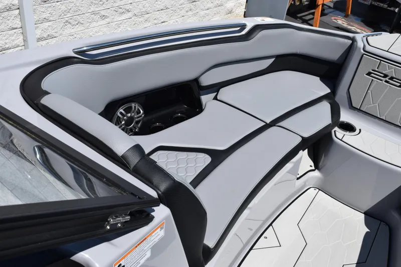 Slide: The Image of Interior of 2026 Yamaha Boats 255XD, featuring sleek seating and modern design elements. - 21