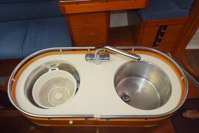 Slide: The Image of 1997 Etap 38i yacht kitchen sink with dual basins and faucet. - 21