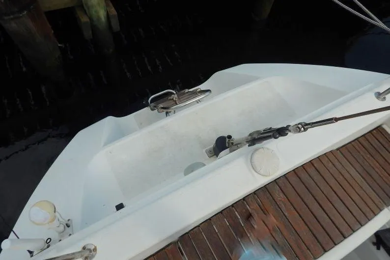 Slide: The Image of Cockpit view of a 1997 Etap 38i sailboat with wooden deck details. - 39