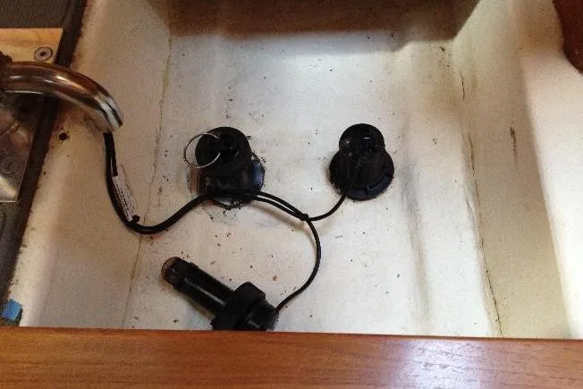 Slide: The Image of Bilge area of a 1997 Etap 38i sailboat with wiring and components visible. - 42