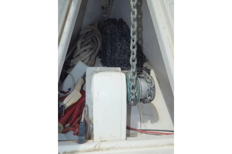 Slide: The Image of Anchor chain and ropes in the storage compartment of a 1997 Etap 38i sailboat. - 44