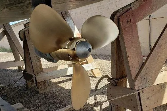 Slide: The Image of Propeller of 1997 Etap 38i sailboat on wooden stand. - 47