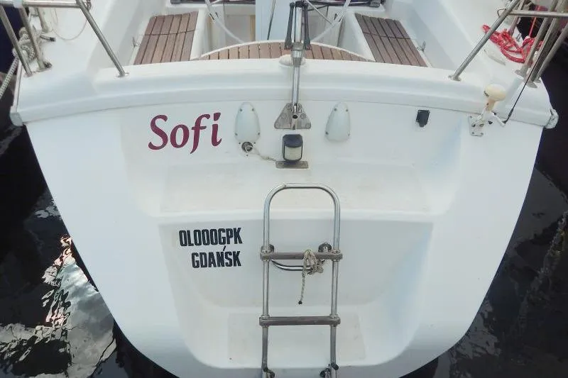 Slide: The Image of Stern view of 1997 Etap 38i sailboat named "Sofi" with ladder and Gdańsk registration. - 52