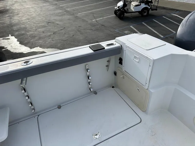 Slide: The Image of Glacier Bay 2680 Coastal Runner 2000, boat deck with storage area. - 17