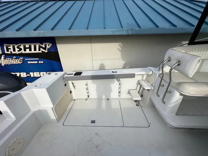 Slide: The Image of Glacier Bay 2680 Coastal Runner, 2000, boat deck and seating area. - 19