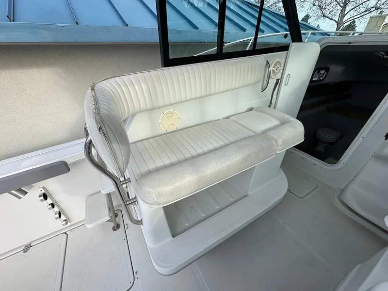 Slide: The Image of Interior of Glacier Bay 2680 Coastal Runner 2000 with bench seating. - 26
