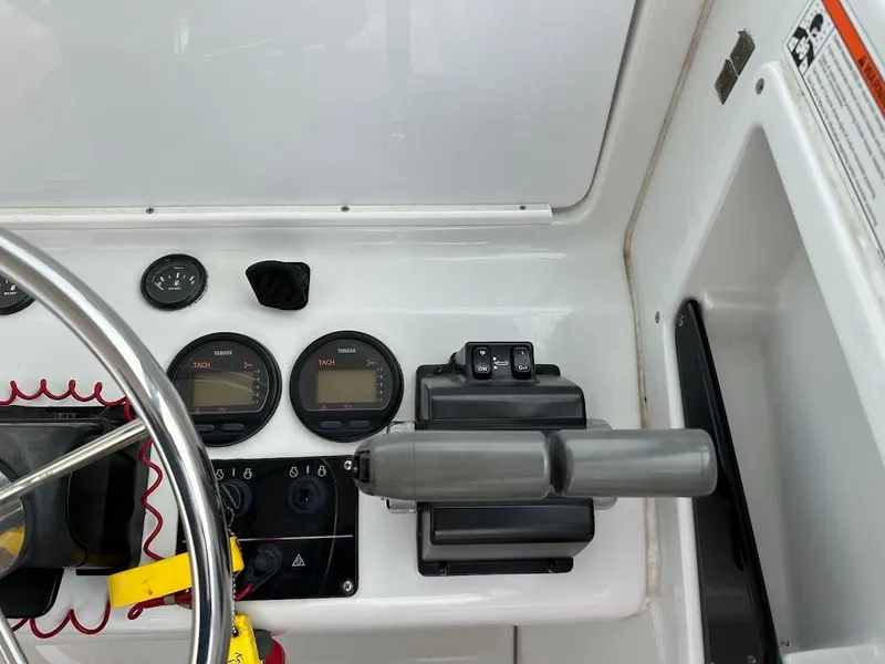 Slide: The Image of Control console of a 2000 Glacier Bay 2680 Coastal Runner boat. - 31
