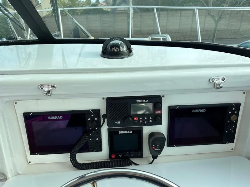 Slide: The Image of Glacier Bay 2680 Coastal Runner 2000 with Simrad navigation system. - 33
