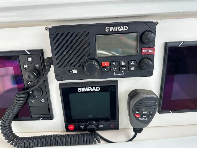 Slide: The Image of Simrad marine electronics on Glacier Bay 2680 Coastal Runner, year 2000. - 35