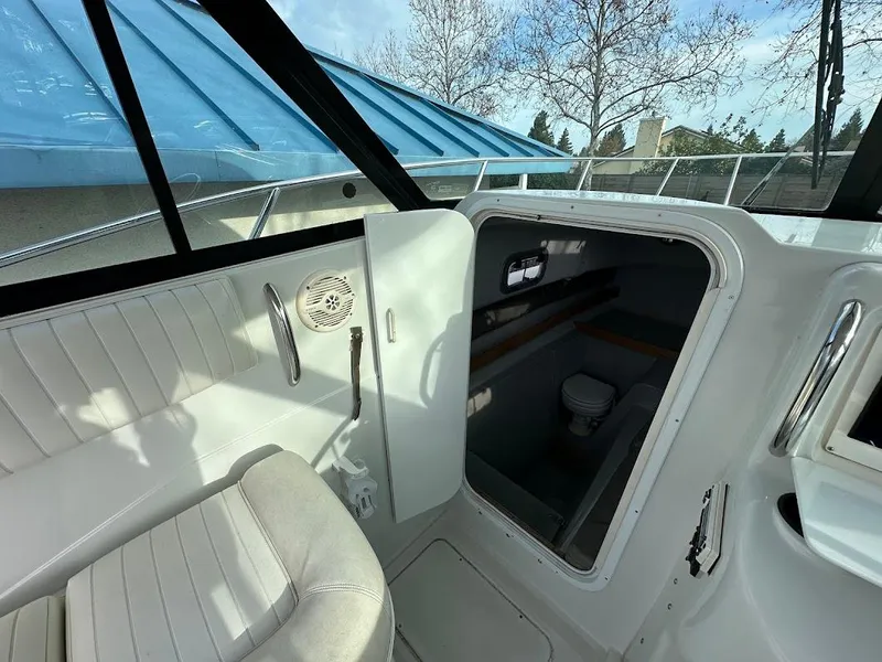 Slide: The Image of Interior of Glacier Bay 2680 Coastal Runner 2000 with cabin and seating area. - 38