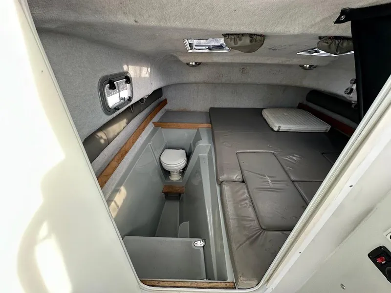 Slide: The Image of Interior of Glacier Bay 2680 Coastal Runner 2000 with sleeping area and toilet. - 39