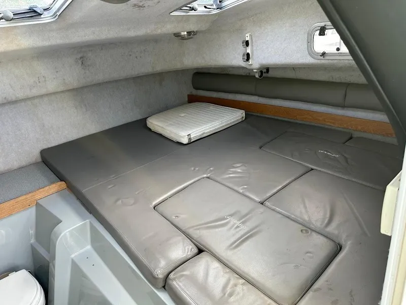 Slide: The Image of Interior of Glacier Bay 2680 Coastal Runner 2000 with cushioned sleeping area. - 41