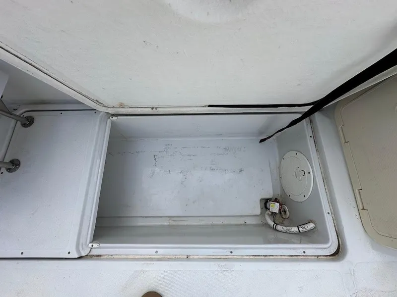 Slide: The Image of Storage compartment in Glacier Bay 2680 Coastal Runner boat, year 2000. - 48