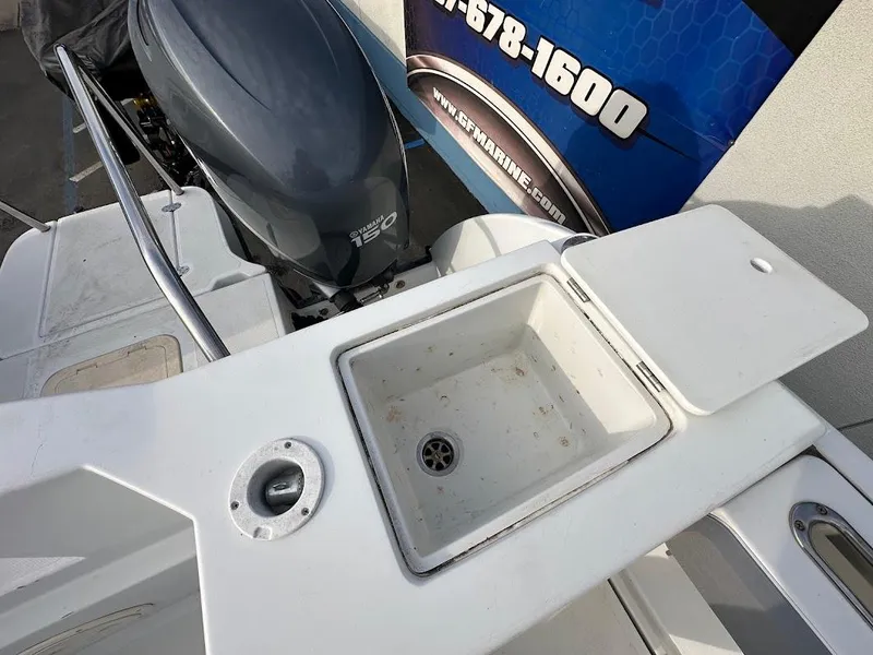 Slide: The Image of Glacier Bay 2680 Coastal Runner 2000 with engine and storage compartment. - 49