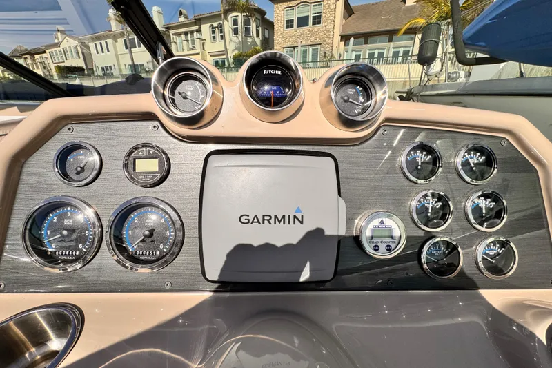 Slide: The Image of Dashboard of a 2012 Formula 290 Sun Sport boat with Garmin navigation system. - 18