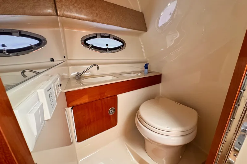 Slide: The Image of Luxurious bathroom in 2012 Formula 290 Sun Sport boat with modern fixtures. - 29