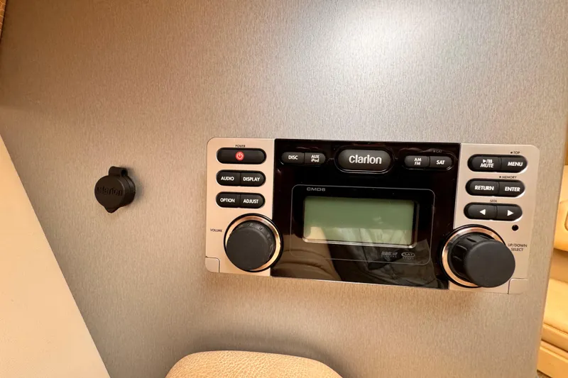 Slide: The Image of Clarion audio system in 2012 Formula 290 Sun Sport boat interior. - 30