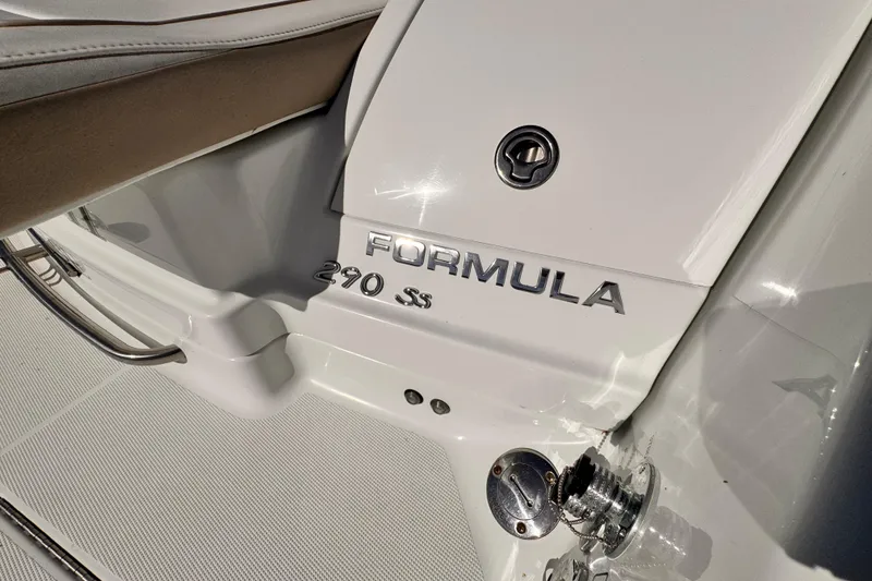 Slide: The Image of 2012 Formula 290 Sun Sport boat detail, featuring sleek design and branding. - 36