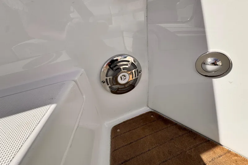 Slide: The Image of 2012 Formula 290 Sun Sport boat interior with speaker and wooden flooring. - 38