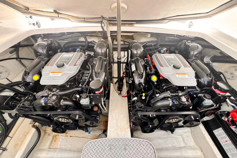 Slide: The Image of Engine compartment of a 2012 Formula 290 Sun Sport boat, featuring dual engines. - 41