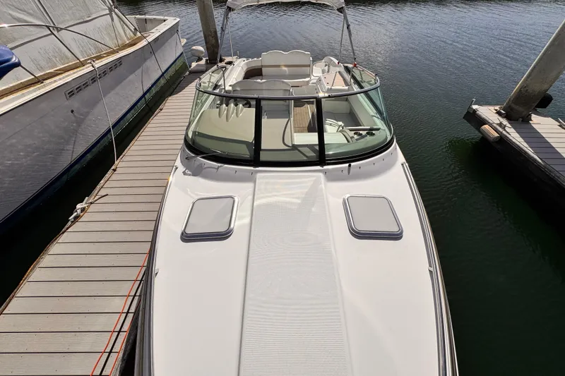 Slide: The Image of 2012 Formula 290 Sun Sport boat docked at marina, top view. - 42