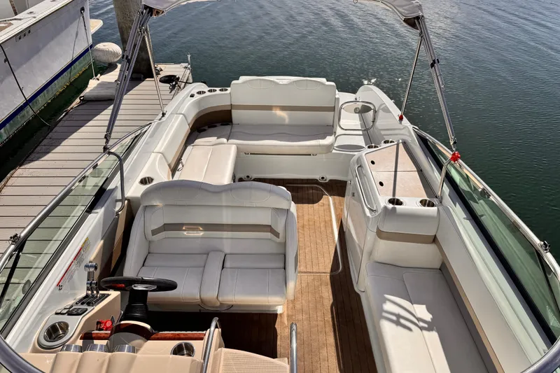 Slide: The Image of 2012 Formula 290 Sun Sport boat interior with spacious seating and elegant design. - 8