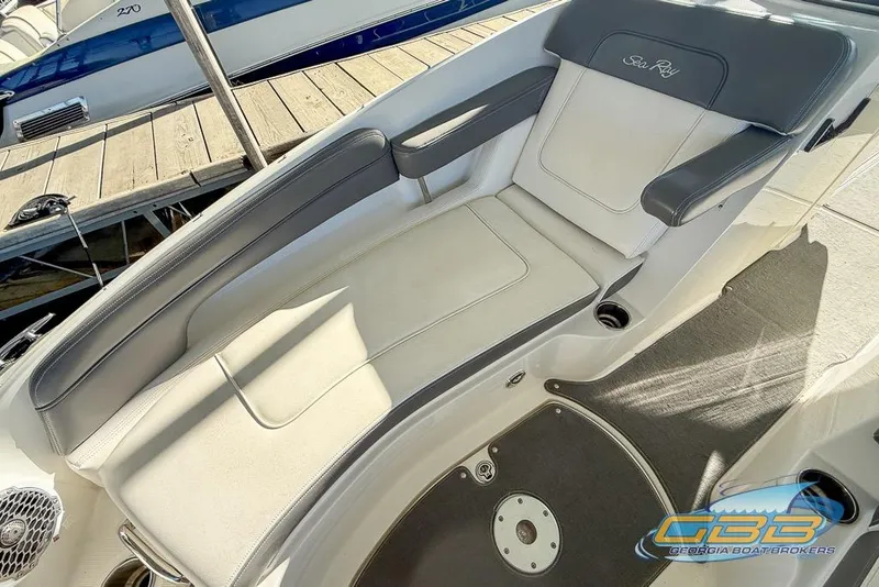 Slide: The Image of 2011 Sea Ray 260 Sundeck interior seating, showcasing luxurious design and comfort. - 14