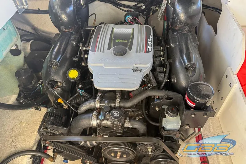 Slide: The Image of Engine of a 2011 Sea Ray 260 Sundeck boat, featuring a MerCruiser 350 MAG. - 18
