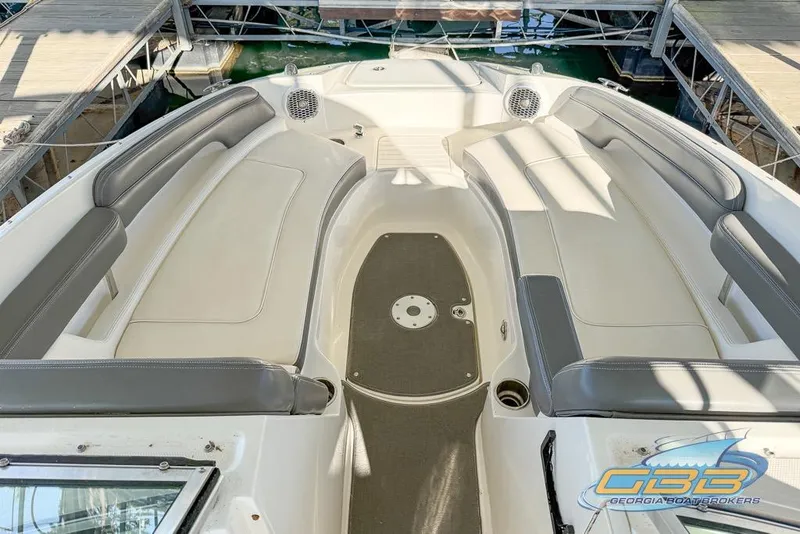 Slide: The Image of 2011 Sea Ray 260 Sundeck interior with spacious seating and modern design. - 4