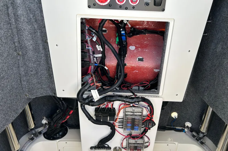 Slide: The Image of Electrical wiring and components inside a 2026 Mako 226 Center Console boat. - 11