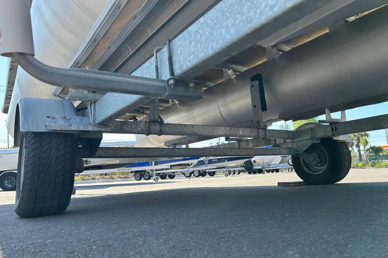 Slide: The Image of Underneath view of a 2021 Godfrey Sweetwater 1880 CX pontoon trailer. - 16