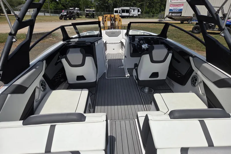 Slide: The Image of 2023 Yamaha Boats 222S interior with sleek seating and modern design. - 19