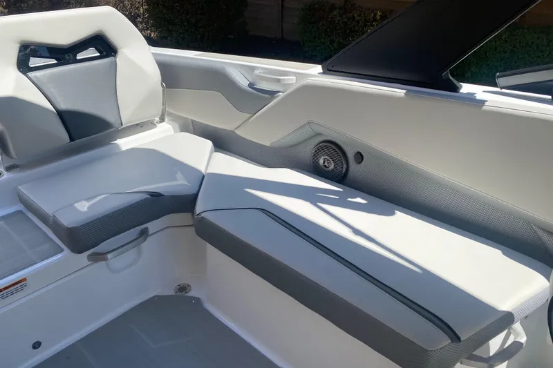 Slide: The Image of Interior seating of 2025 Scarab 235 SE boat, featuring sleek, modern design and comfortable upholstery. - 16
