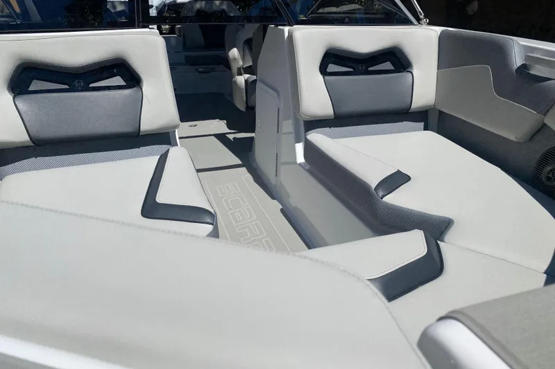 Slide: The Image of 2025 Scarab 235 SE boat interior with modern seating and sleek design. - 2