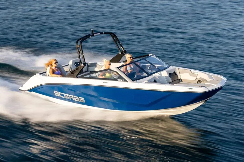 Slide: The Image of Manufacturer Provided Image: 2025 Scarab 235 SE boat cruising swiftly on water. - 26