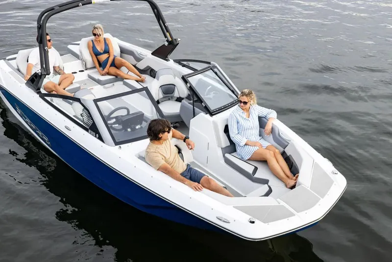 Slide: The Image of Manufacturer Provided Image: 2025 Scarab 235 SE boat on water with passengers. - 27