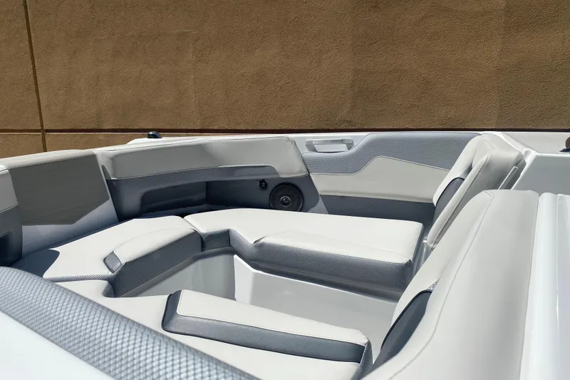 Slide: The Image of 2025 Scarab 235 SE boat interior with sleek, modern seating design. - 3